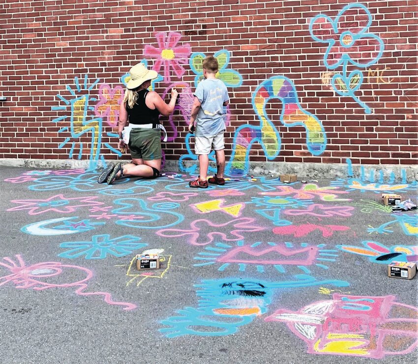 Artist Molly Reagan will lead a street chalk art session at Arts Off Main Aug. 3 in Cortland. Expect a puppet-making class, splatter art and other art you can do, in addition to admiring it.