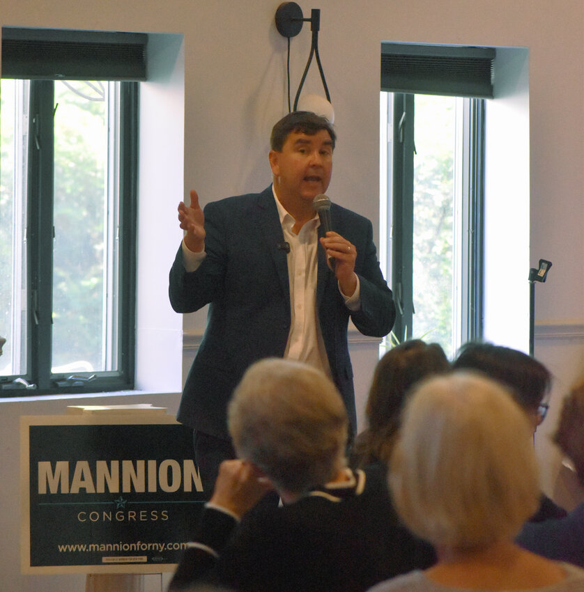 Congressional candidate John Mannion of Onondaga County, a Democrat, stumps Saturday in Homer. He spoke at the Center for the Arts, after visiting the Homer Farmers Market earlier in the day.