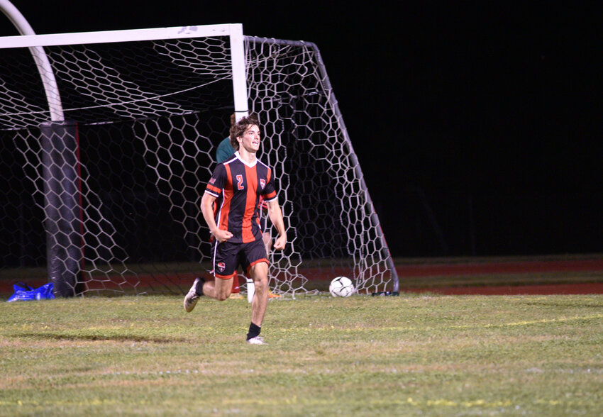 Tully's Julian Shay celebrates after scoring the game-winning goal Wednesday night at Tully High School. Shay recorded a goal and an assist in the Black Knights' 2-0 win.