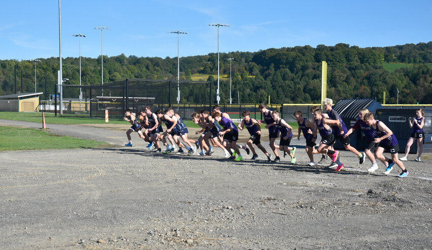 The Cortland and Homer boys cross country teams start a scrimmage race Wednesday at Gutchess Lumber Sports Complex. Both teams will call the complex home after breaking in the new cross country course Wednesday.