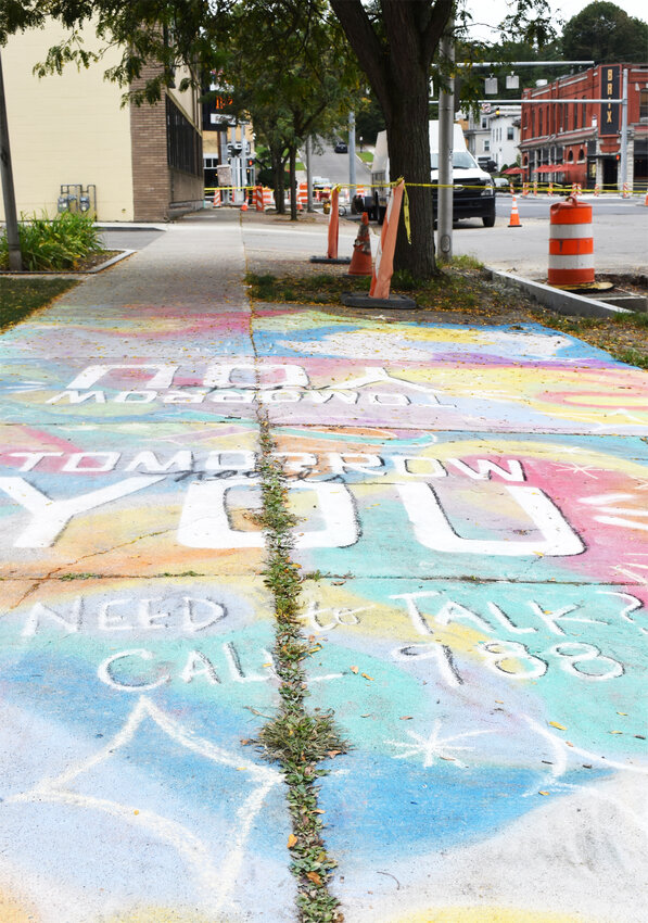 The sidewalk in front of Grace and Holy Spirit Church on Court Street in Cortland calls attention to the state's 988 help line to prevent suicide. September is National Suicide Prevention Month.