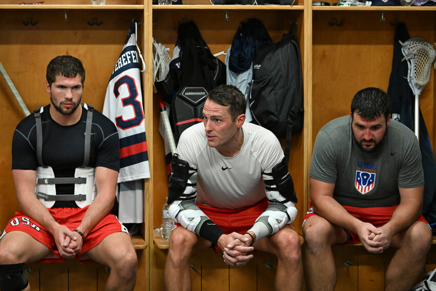 Cortland native Joel White, center, talks to his teammates before a game against the Haudenosaunee Friday at the Adirondack Bank Center.