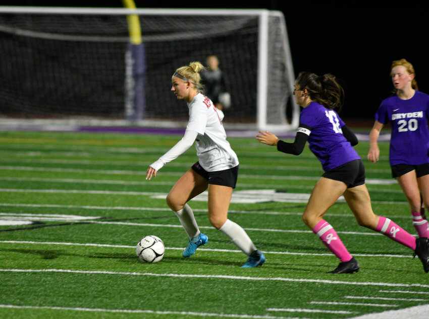 Groton's Devyn Blasz plays the ball Tuesday at Dryden High School. Blasz scored one of the three Red Hawk goals in the win.