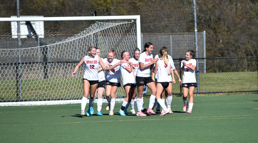 The Groton girls soccer team celebrates after winning the IAC Small Schools championship game Saturday at Tompkins Cortland Community College.