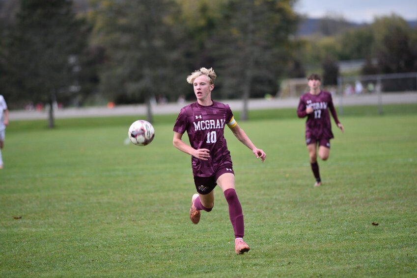 McGraw's Logan Moffitt chases down the ball earlier this season at Bennett St. Field.