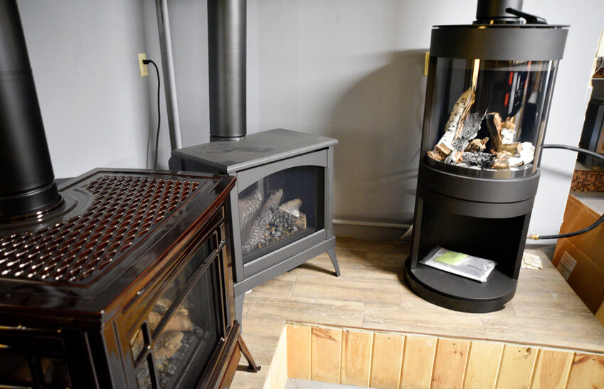 Gas appliances, such as the ones sold at Papa Bears Stoves in Marathon, will soon be banned in new construction under New York law.