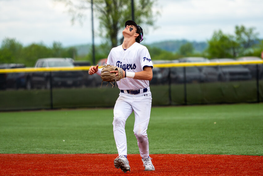 Cortland baseball junior Owen Johnson looks up to track a pop fly earlier this season at Gutchess Lumber Sports Complex. Johnson is one of five Cortland players batting over .400 13 games into the season.