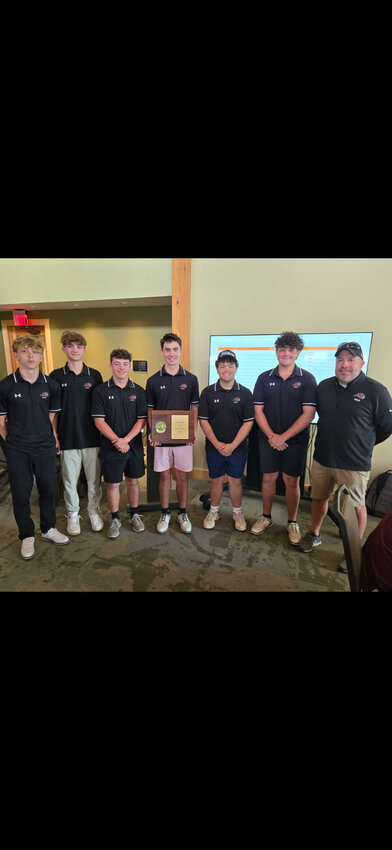 The Groton boys golf team poses with the Section IV Class D championship plaque.