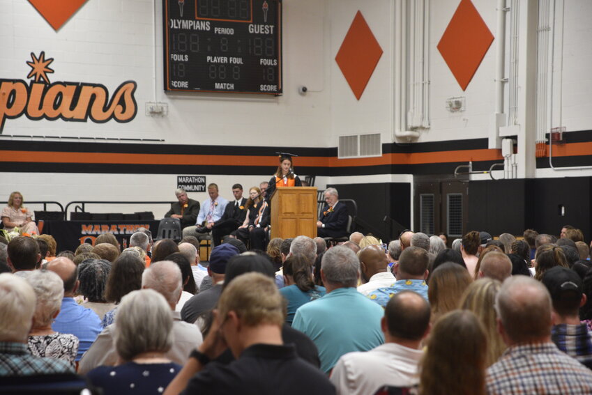 Valedictorian Abigail Edsall speaks at Marathon High School during Sunday’s graduation ceremony.