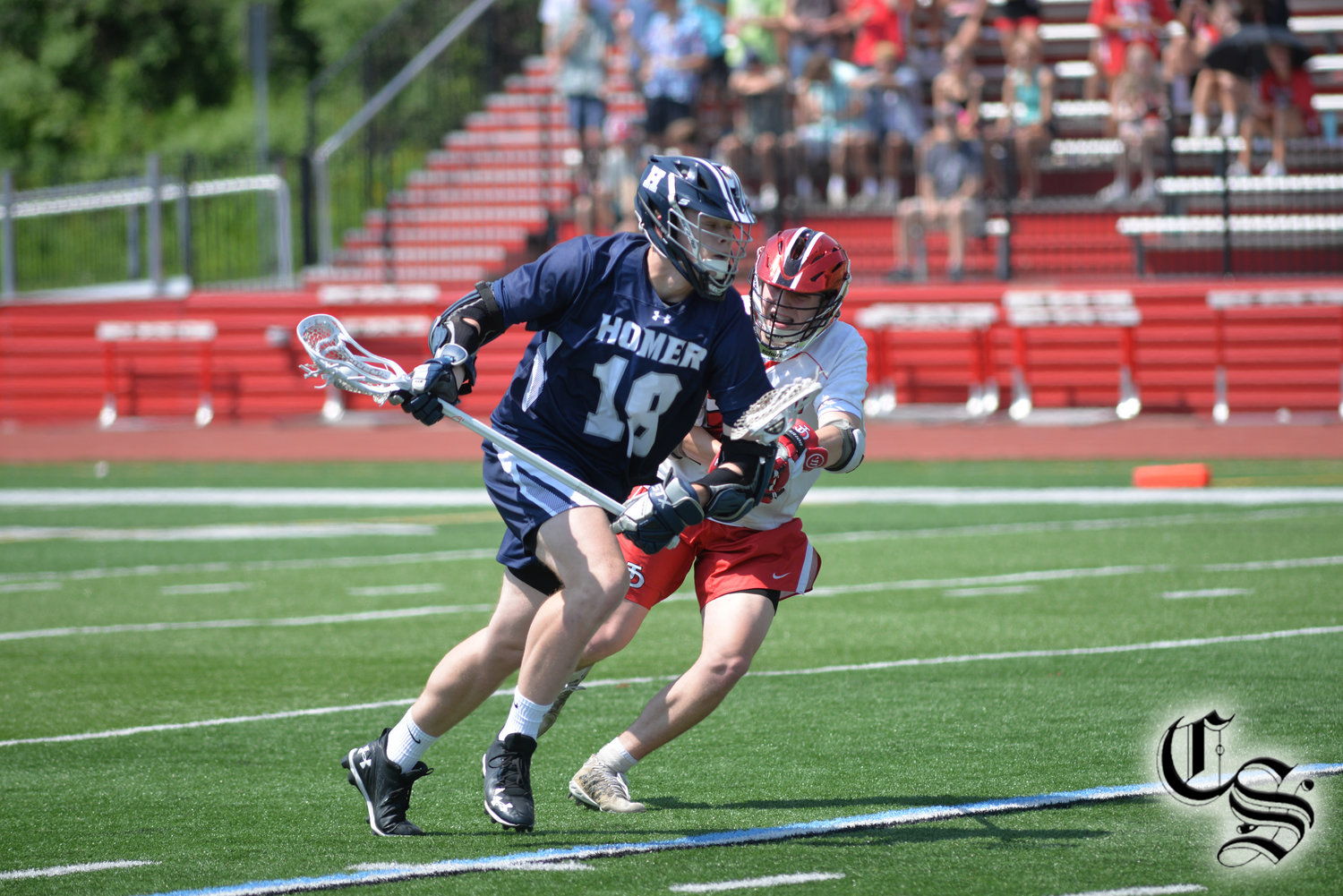 Homer’s Wyatt Wilbur, left, makes a move to get past a Jamesville-Dewitt defender last year. Wilbur is one of Homer’s top returning players in head coach CJ Nye’s first season.