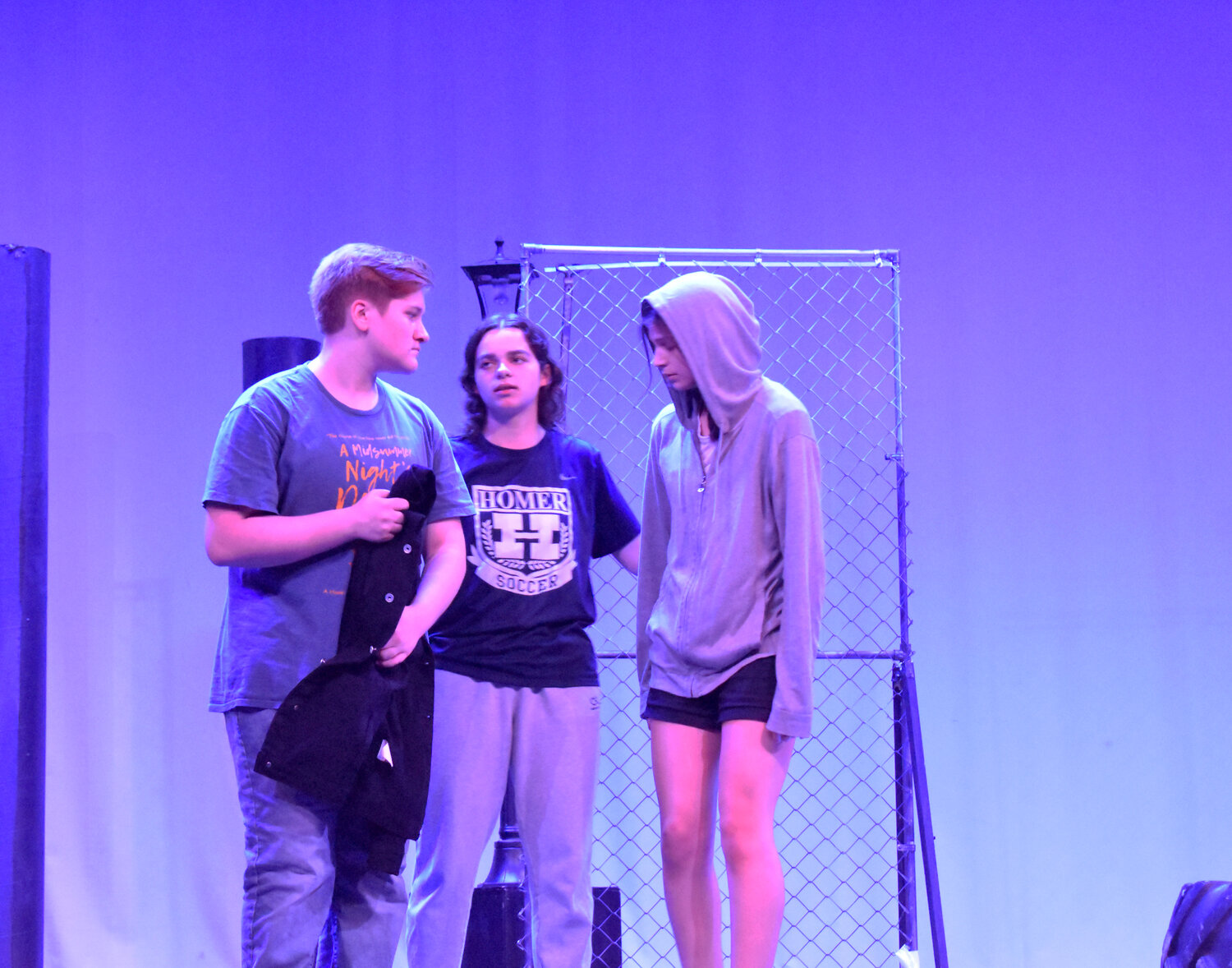 Remy Jensen, Ruthalina Caravella and Emma Robideau run through a scene from the Homer Thespian Society's production of 
