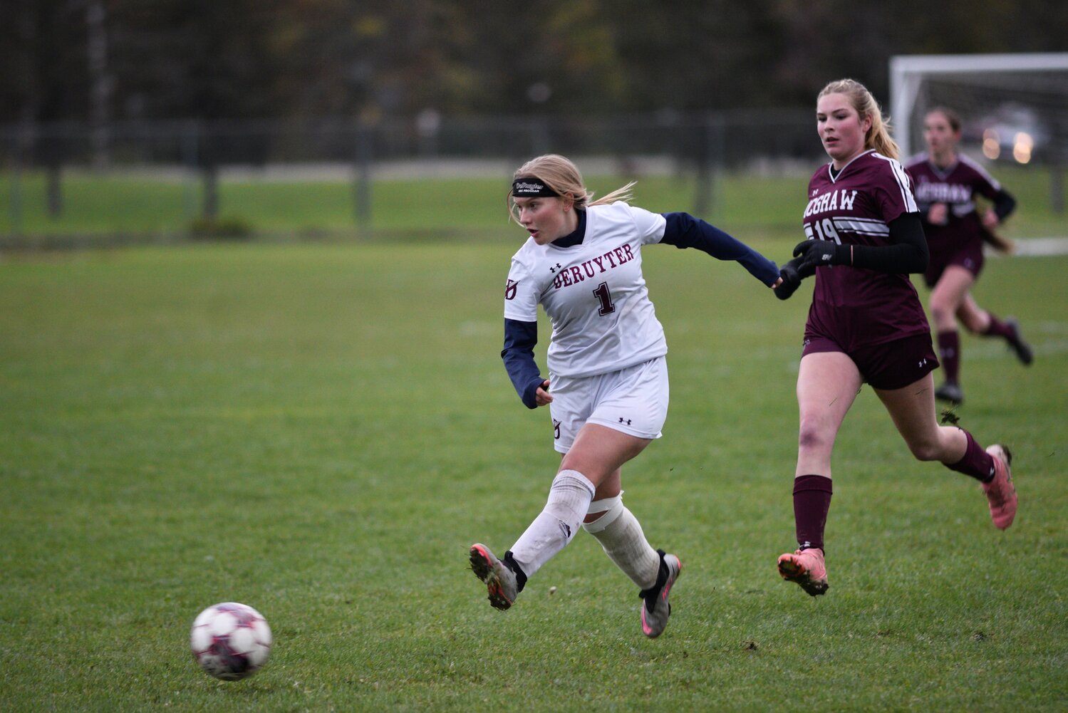 DeRuyter’s Molly Amidon follows through after playing a ball to the middle of the field Wednesday at Bennett St. Field. Amidon scored twice in the Rockets’ 3-1 win.