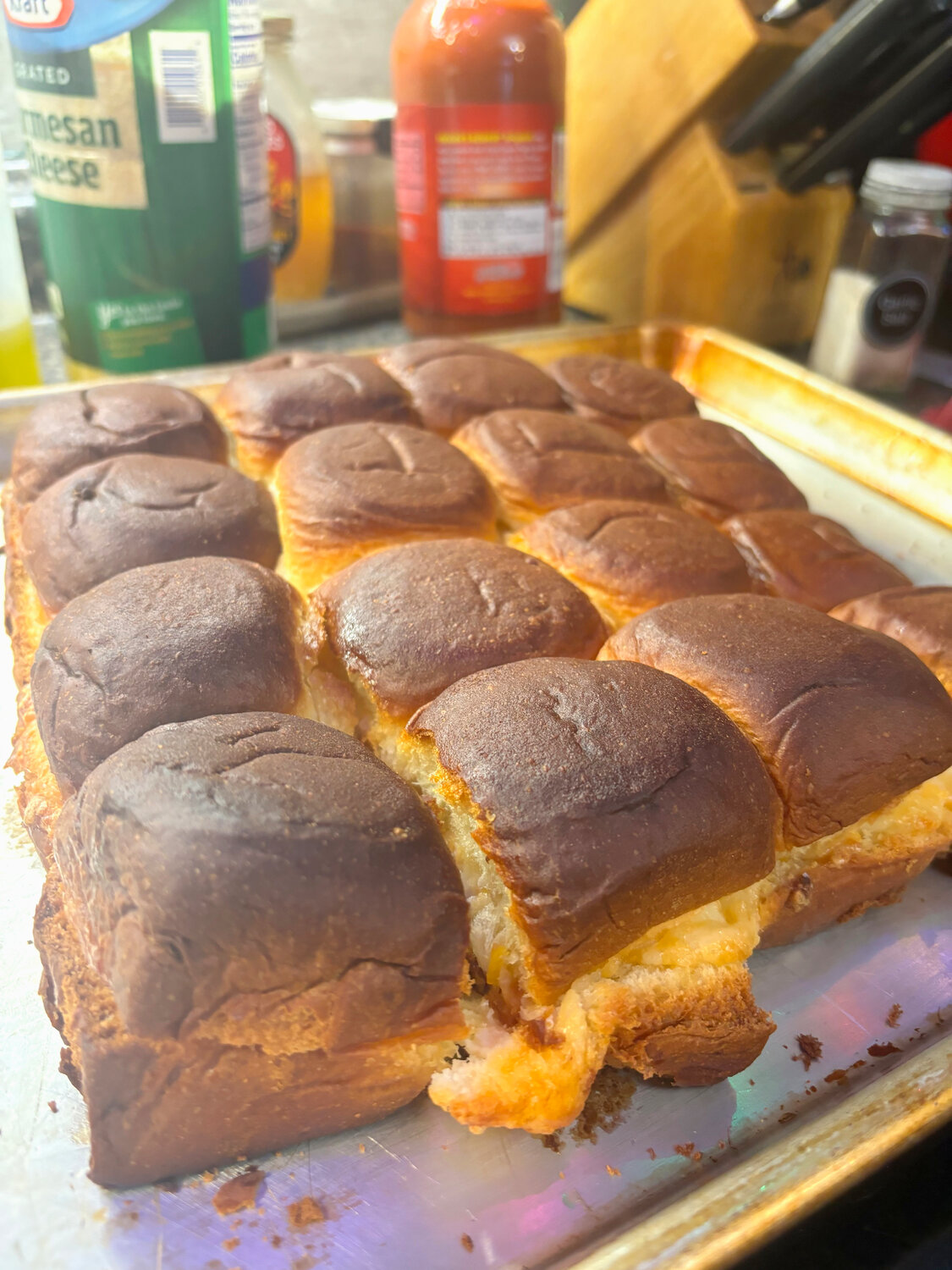 The trick to a great grilled cheese slider: sweet rolls and mayonnaise.