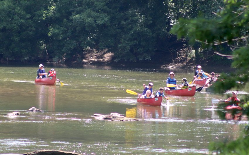 Taking part in the Friend of Sugar Creek &ldquo;Kids Canoes and Crinoids&rdquo; canoe trip down Sugar Creek on Saturday, several participants and their leaders make the final push toward Rock River Ridge Trailhead after stopping along the way to observe fossils and learn about nature.