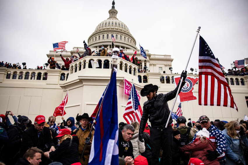 Pro-Trump supporters storm the US Capitol following a rally with President Donald Trump on January 6, 2021 in Washington, DC. Trump supporters gathered in the nation's capital today to protest the ratification of President-elect Joe Biden's Electoral College victory over President Trump in the 2020 election.