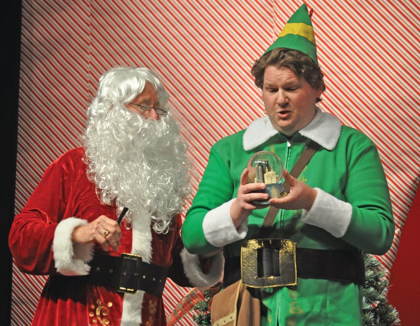Brian Swick (Buddy), right, and Steve Frees (Santa) rehearse a scene for the Sugar Creek Players production of