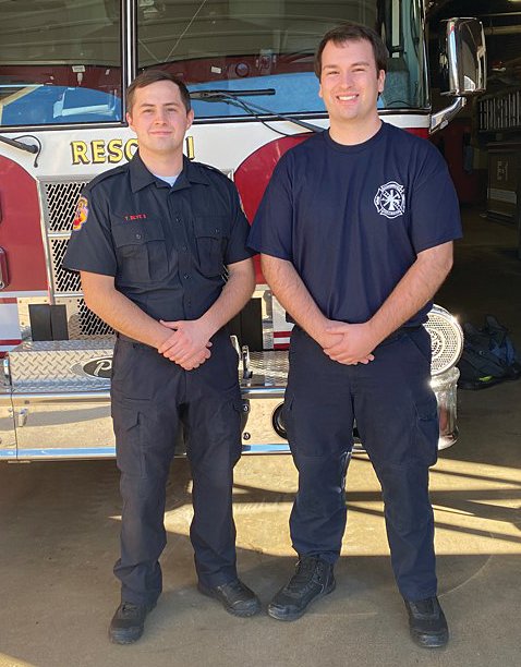 Timothy Blye, left, and Gage Corbett pose for a photo during one of their first shifts on the CFD.