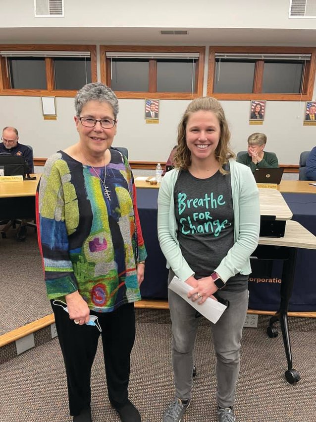 Dr. Kathy Steele, left, representing the Montgomery County Retired Teachers Association, presents a grant to Cassie Bever, North Montgomery High School teacher and instructional coach, to support the Breathe for Change program.