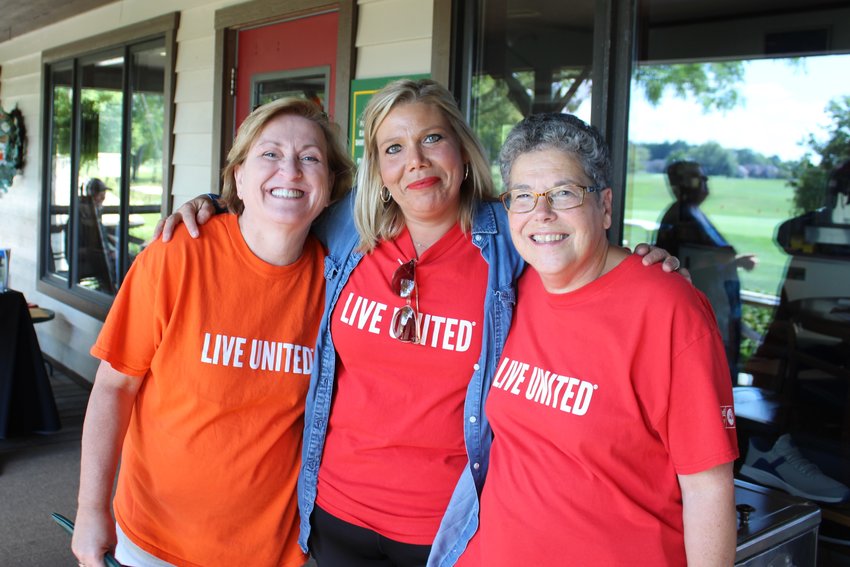 Dr. Kathy Steele, local United Way campaign chair, right, poses with Kayla Bretney of a MetroNet business account executive, middle, and Michele Hunley, owner and president of Michele Hunley American Family Insurance, during the kick-off lunch and golf scramble Sept. 9 at Rocky Ridge Golf Club near Darlington.