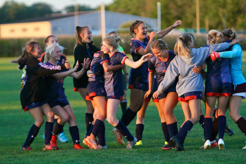 North Montgomery girls soccer celebrates their thrilling shootout win over county rival Crawfordsville on Thursday.