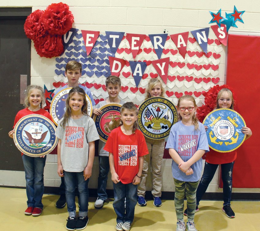 Turkey Run Elementary students participating in the Veterans Day program are front- Abby Hill, Rebel Roemer, Havik Roemer and Javelin Wallace; back- Luke Mauntel, Jaxson, Woods, Cobie McCrory, and Savanna York. Not pictured are Julia Helderman and Taylor Snell.