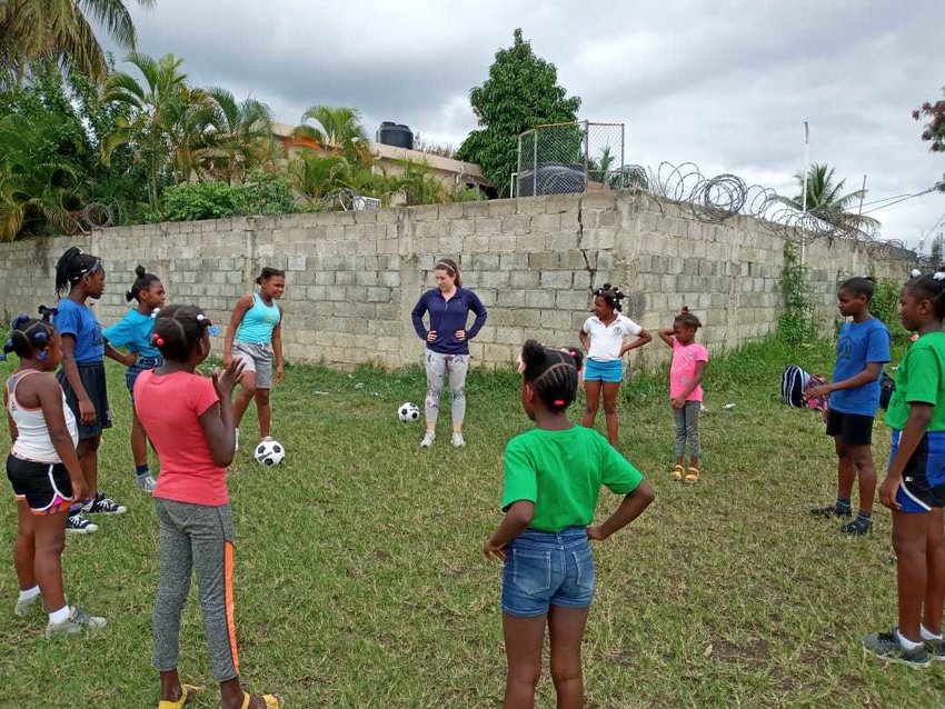 Katie Baird coached girls&rsquo; soccer each week while on her mission trip.