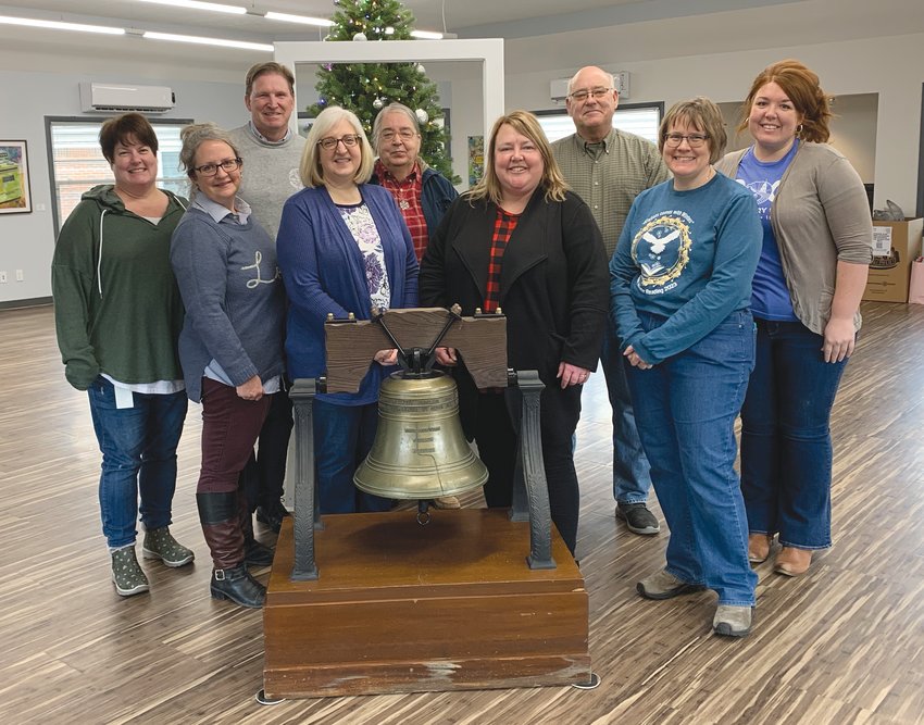 Members of the Montgomery County Bicentennial Committee pose Wednesday with the Liberty Bell at the Montgomery County Government Center.