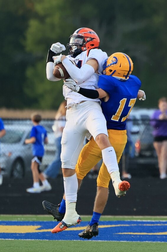 North Montgomery's Kelby Harwood goes up for a leaping catch against Crawfordsville. The junior had 3 catches for 46 yards and a TD in the 42-14 North Montgomery county title win.