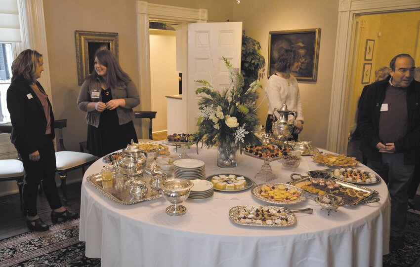 The 17th annual Holiday Tea and Fashion Show was held Friday at the Elston Homestead. The event is a fundraiser for the Gen. Lew Wallace Study &amp; Museum. Event goers enjoyed tea and coffee, sandwiches and desserts, a fashion show, live entertainment by the Wabash Glee Club and door prizes.