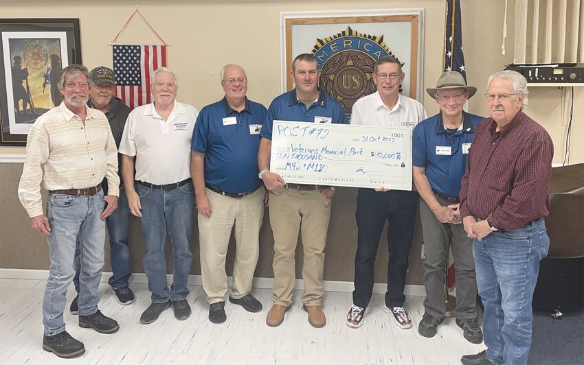 American Legion Byron Cox Post 72 in Crawfordsville recently donated $10,000 to the Veterans Memorial Park being established in Crawfordsville. The donation was to pay to transport the M42 Duster and M110 Howitzer exhibits from a museum in Virginia that closed. Pictured are Post 72 executive board members Bruce VanIderstine and Larry Cooper, VMP vice president and Post 72 vice Commander and executive board member Mike Spencer, VMP board advisor Mark Eutsler, VMP president Kevin Cobb, Post 72 Commander and VMP treasurer Marc Gabel, VMP board member Bill Durbin and Post 72 executive board member Linn Hutchison.