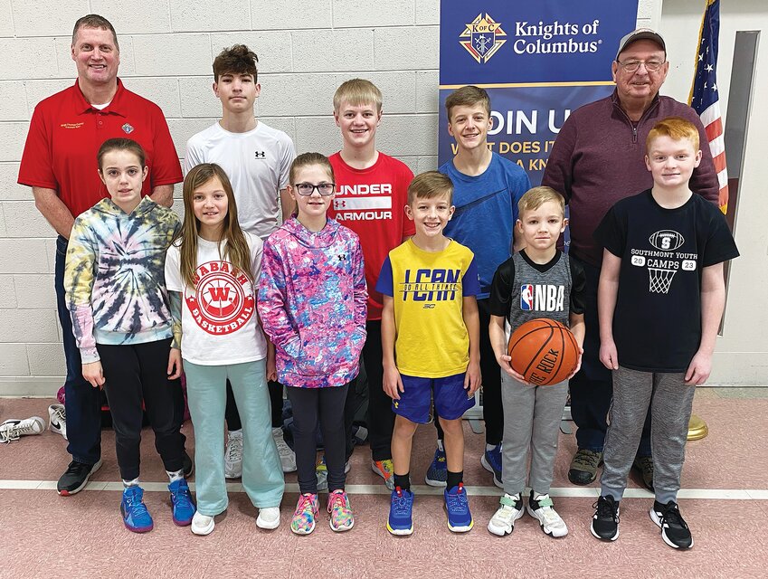 The K of C Council 1591 conducted a Free Throw Championship on Jan. 14 at St. Bernard Catholic Church. Participants pictured, are from left, front row, Chanlie Busch&nbsp;(11 year old girls, first place), Emmerson Busch&nbsp;(9 year old girls, first place), Kenlie Nolan (10 year old girls, first place), Cooper Pierce (10 year old boys, first place), Colton Watson (9 year old boys, first place) and Jaron Swick (13 year old boys, first place); and back row, chairman Michael Scheidler, Jaxon&aring;&ccedil; Wireman (14 year old boys, first place), Karter Nolan (13 year old boys, second place), Owen Pierce (14 year old boys, second place) and Bernie Williams, K of C Council 1591 Grand Knight. First place winners advance to the regional finals at 1 p.m. Feb. 18 at the Clinton County Boys &amp; Girls Club in Frankfort.