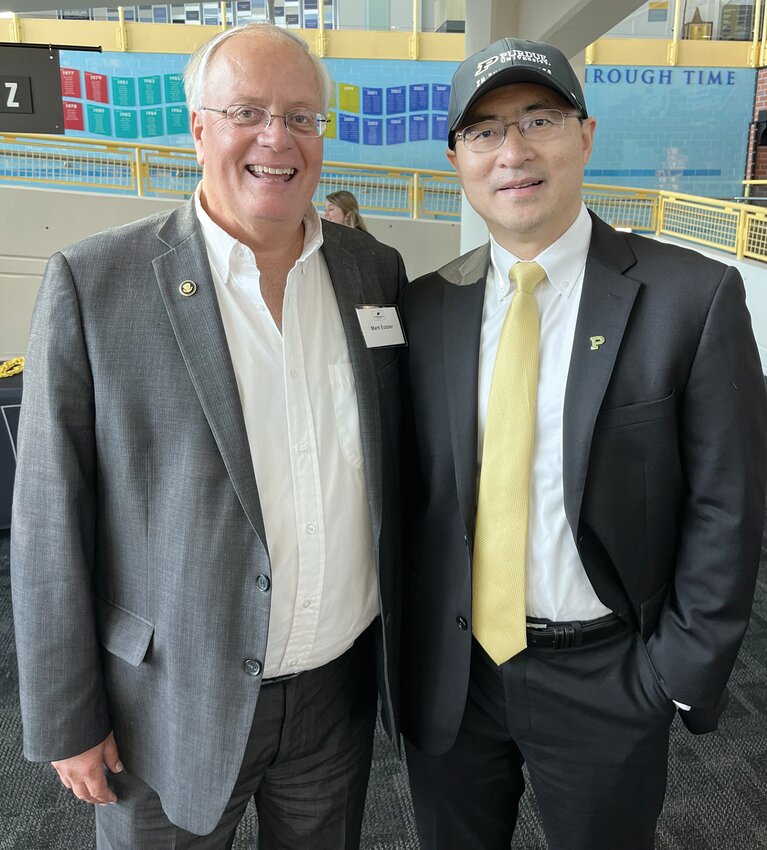 Purdue Education Engagement Board Member Dr. Mark Eutsler, left, poses with Purdue President Dr. Mung Chiang during a Purdue for Life Foundation reception at The Children's Museum in Indianapolis.