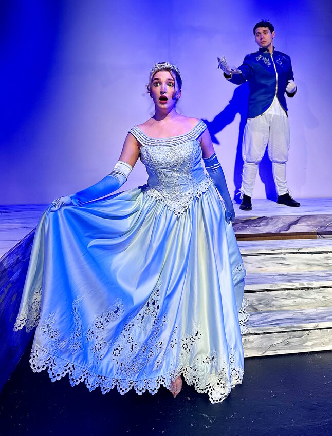 Cinderella (Victoria Behny) flees the steps of the palace as the Prince (David Couter) finds her glass slipper in Rodgers &amp; Hammerstein