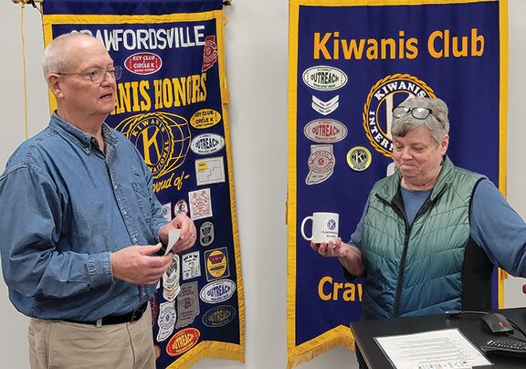 Pictured are Kiwanis Treasurer Jim McCampbell, left, and Karen Branch.