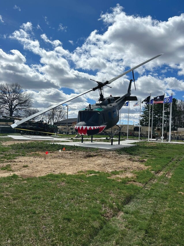 The latest addition to the Veterans Memorial Park landed in Crawfordsville on Saturday. The refurbished 1969 U.S. Army Bell UH-1 Huey helicopter arrived from Spring Hill, Florida. The aircraft was used for exertion, extraction, re-supply and as a medi-vac during Vietnam War. Froedge’s unloaded the helicopter and assembled the rotor and blades before placing it in the park.