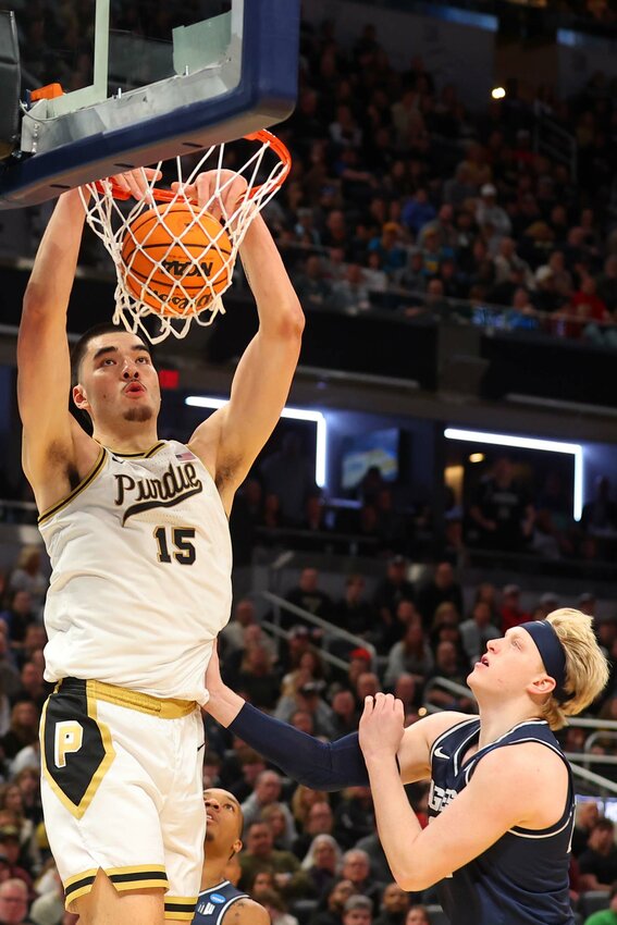 Zach Edey of Purdue - dunking for two of his game-high 23-points against Utah State.