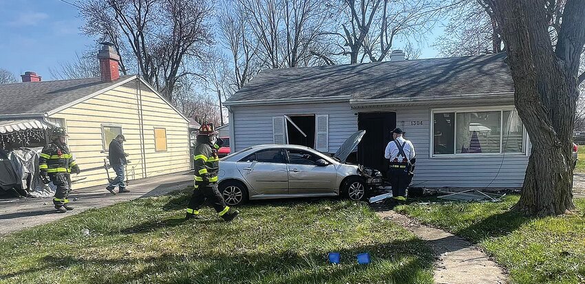Crawfordsville police and fire department personnel responded just before noon Thursday to a report of a vehicle striking a house in the 1300 block of Mill Street. There were no injuries reported.