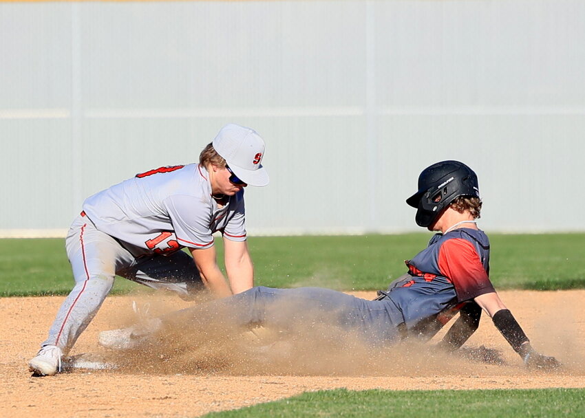 Southmont second baseman Phisher Benge makes a tag on the Bethesda Christian runner sliding into second base.