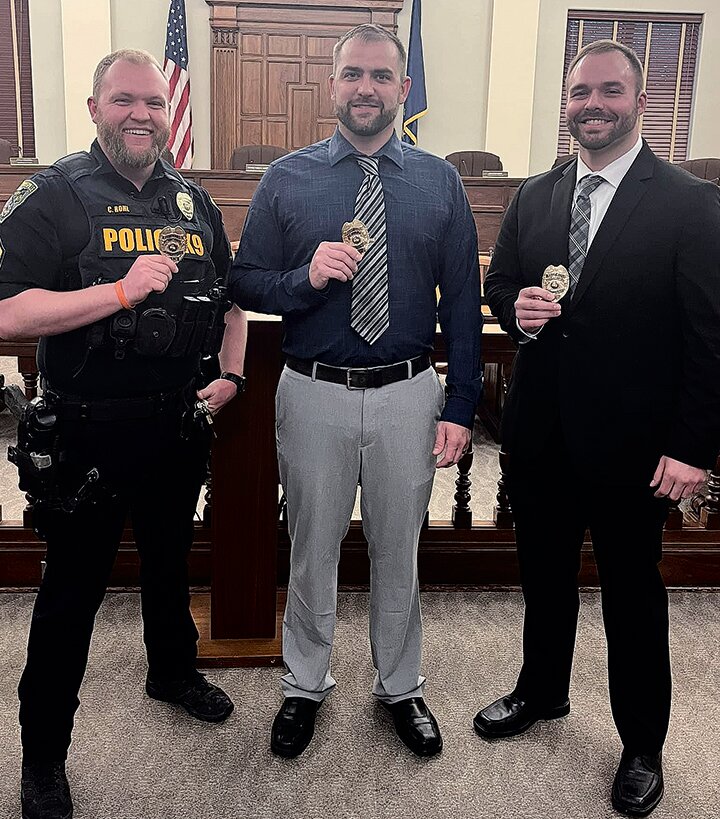 Crawfordsville Police Department officers earning promotions Monday are, from left, Lt. Corey Rohl, Sgt. Luke McVay and Sgt. Adam Totheroh.