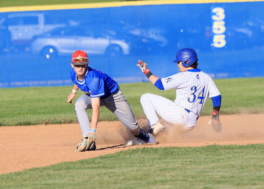 Bryce Dowell slides into second base during a back and forth pitchers dual between Crawfordsville and Western Boone on Tuesday which saw the Stars come away with a 2-1 win.