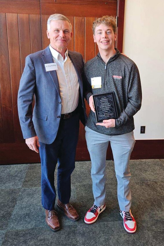 Wabash College student Austin PIckett, right, received the &ldquo;Realizing the Dream&rdquo; scholarship, one of 29 first-generation college students statewide to be honored. He is pictured with Dr. Greg Redding, Dean of Students and Associate Professor of German.