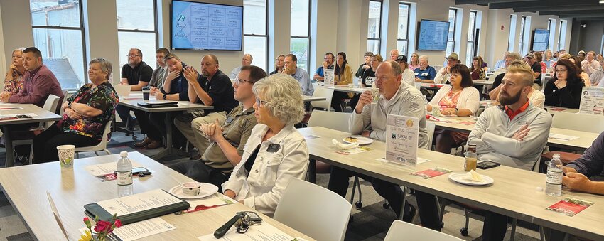 Chamber of Commerce members gather Monday at Fusion 54 for the annual meeting of the organization.