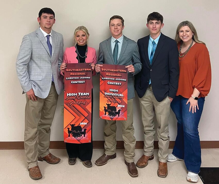 North Montgomery High School&rsquo;s Livestock Judging Team holds their banners won at the Virginia FFA Regional. Pictured, from left, are Mitchell Shepherd, Grace Mosley, Brent Runyan, Cade Parks and coach Jaci Albregts.