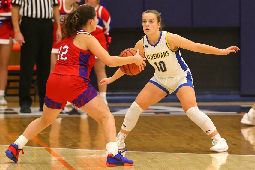 Molly Pierce of Crawfordsville plays defense against Ila Stokes of Western Boone in last year's Sugar Creek Classic.