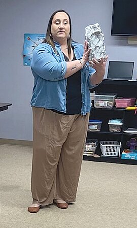 Sarah Fadil then conducted a white elephant auction to replenish the philanthropy fund.