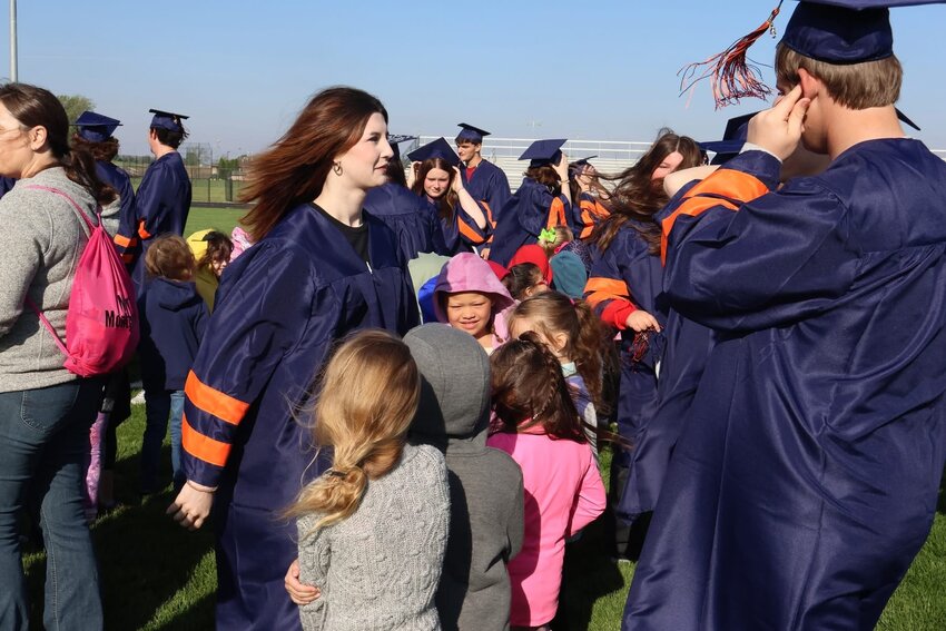 Generational Moment
The North Montgomery High School Class of 2025 met the Kindergarten Class of 2037 for a special photo full of smiles, high-fives and inspiration on Friday. “It was a beautiful reminder of how far our students come and how bright the future is,” said Dr. Colleen Moran, superintendent. She thanked the kindergarten teachers from Pleasant Hill, Sugar Creek and Sommer for helping guide the youngest Chargers and making the morning so memorable. Moran also gave a special shout out to SRO AJ Rice for capturing the moment from above with incredible drone photos.