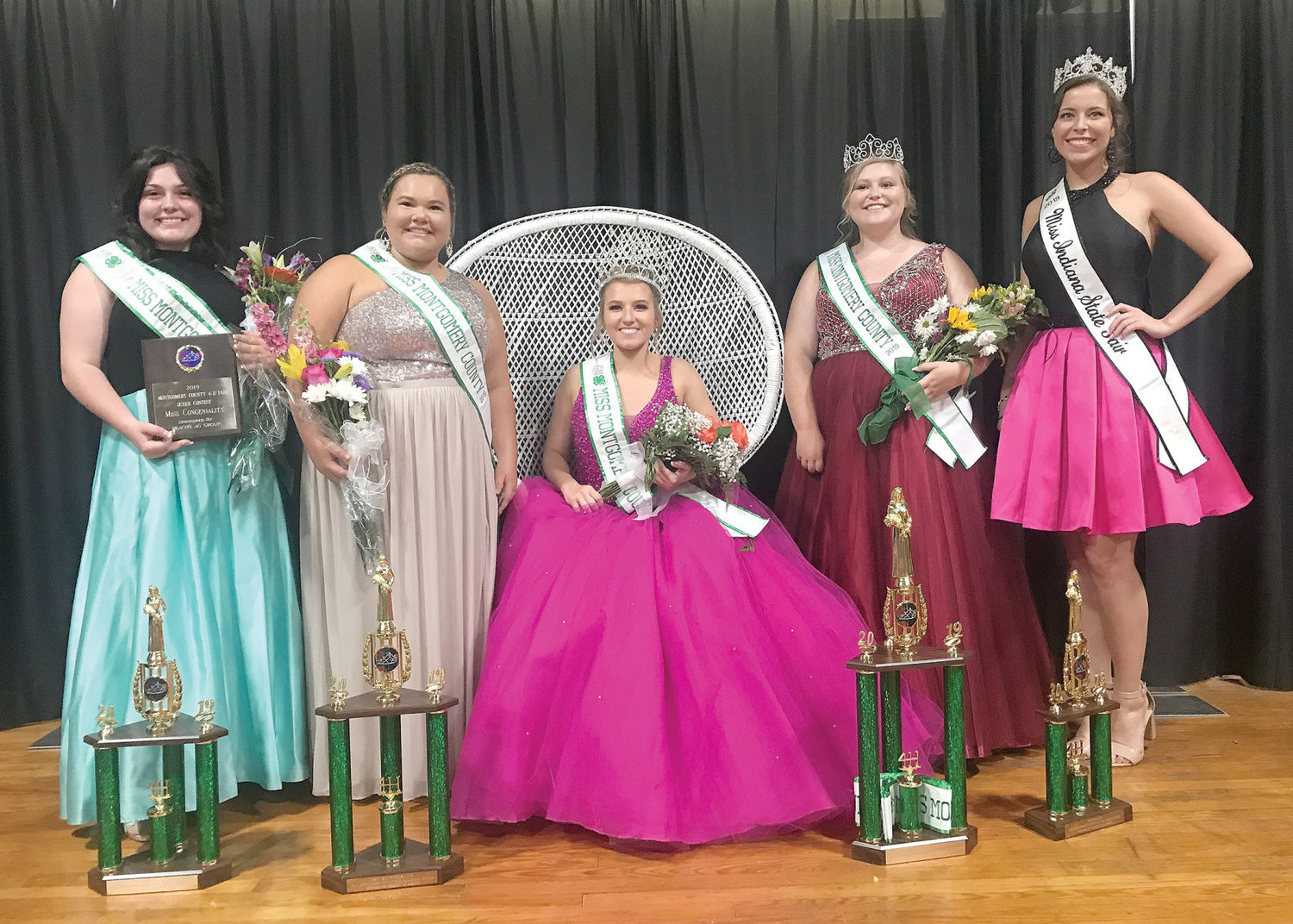 Jett McClaskey, seated, was named Miss Montgomery County 2019 on Saturday at the 4-H fairgrounds. She is pictured with, from left, Aubry Patton, Miss Congeniality and second runner-up; Abbigayle Benge, first runner-up; Shyana Busse, Miss Montgomery County Princess and recipient of the Elaine Chambers Mental Attitude Award; and special guest Halle Shoults, Miss Indiana State Fair Queen 2019.