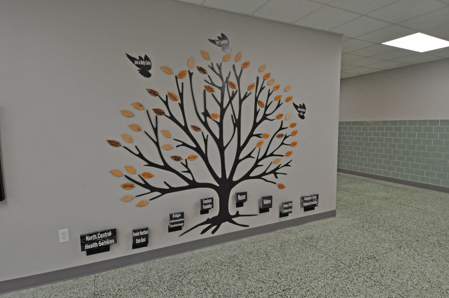 This donar tree on a wall located inside the main entrance lists all of those — both individuals and businesses — that helped fund the new Youth Service Bureau's building.