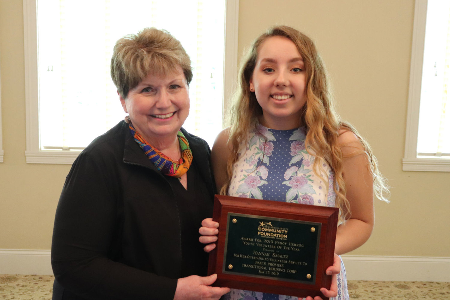 Peggy Herzog, left, presented the 2019 Peggy Herzog Youth Volunteer of the Year to Hannah Smaltz, a volunteer at Pam’s Promise Transitional Housing. As part of the recognition, MCCF presented a $1,000 to Pam’s Promise in honor of Hannah’s service.