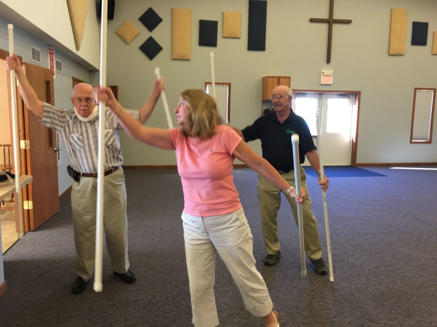 Linda Himes leads Parkinson’s disease patients through a series of exercises to help improve balance, coordination and agility during a recent meeting of CLIMB.